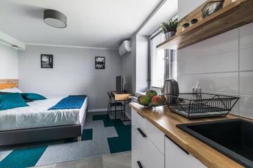 Фото номера Двухместный номер Делюкс с 1 кроватью Апарт-отели Apartamenty Medyka Park г. Medyka 3