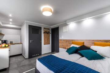 Фото номера Двухместный номер Делюкс с 1 кроватью Апарт-отели Apartamenty Medyka Park г. Medyka 7